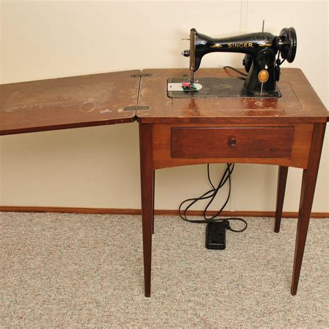 value of vintage steel singer sewing machine in wood cabinet|1950s sewing machines with cabinet.